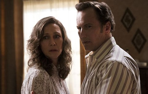 Vera Farmiga, left, and Patrick Wilson in “The Conjuring: The Devil Made Me Do It.”