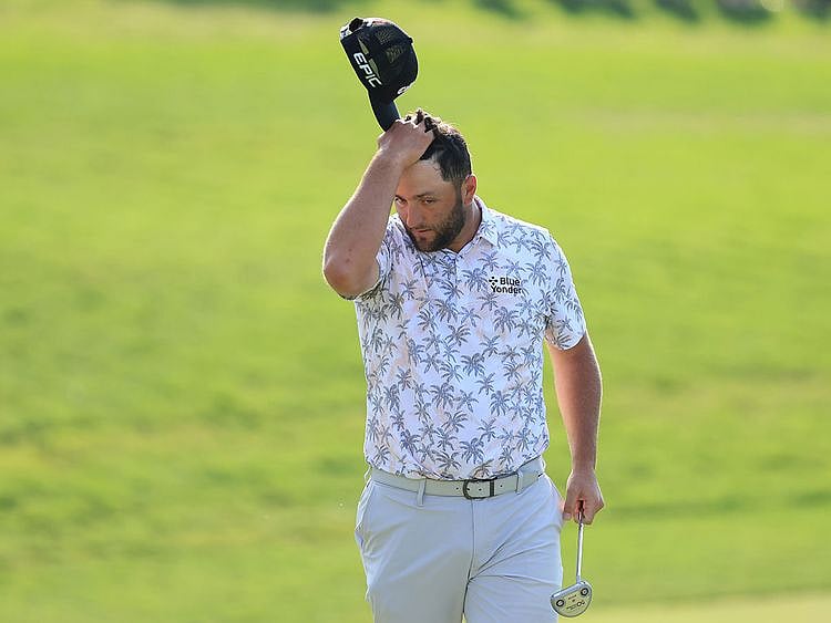 Jon Rahm reacts as he walks off the 18th green after completing his third round of The Memorial Tournament at Muirfield
