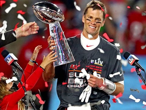 An autographed Tom Brady rookie card printed in 2000 sold for a record $3.107 million at the Lelands Mid-Spring Classic auction.