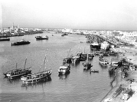 Dhows on the Dubai Creek. From a cluster of villages on the Arabian Peninsula engaged in pearl diving and spice trading, a nation has emerged with enviable economic strength.