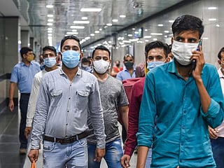 Photos: Delhi, Mumbai begin easing COVID-19 lockdowns