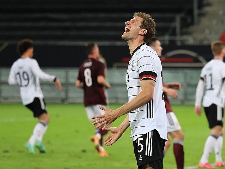 Thomas Mueller celebrates against Latvia