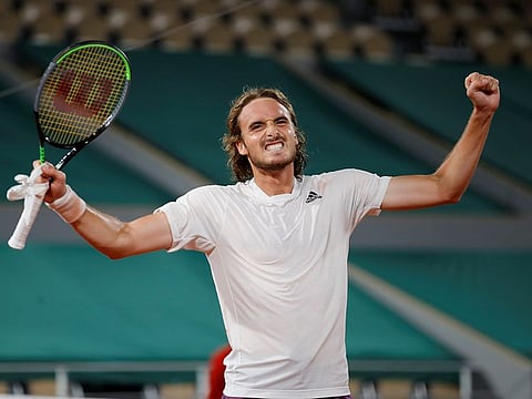 Greece's Stefanos Tsitsipas celebrates after winning his quarter final match against Russia's Daniil Medvedev.