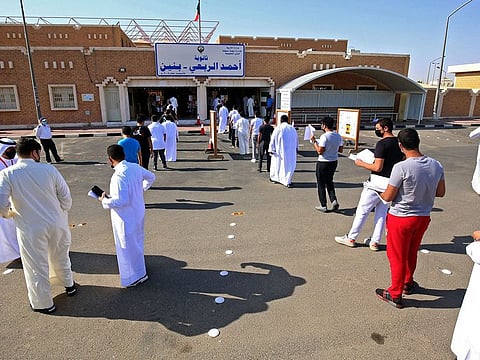 Senior students in Kuwait's public schools arrive for the first day of their graduation exams in Kuwait City in a file picture.