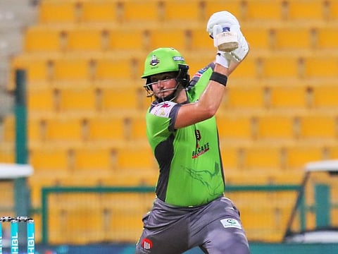 Lahore Qalandars' Tim David on way to his explosive innings of unbeaten 64 against Peshawar Zalmi on Thursday.