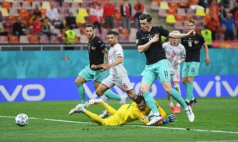 Austria's Michael Gregoritsch scores their second goal againt North Macedonia in their Group C match which they won 3-1.