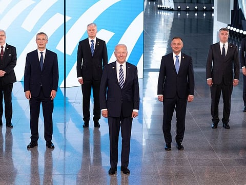 Nato Secretary General Jens Stoltenberg, second left, and US President Joe Biden, centre, pose with other leaders during a family picture at the Nato headquarters on June 14, where the 30-nation alliance hopes to reaffirm its unity and discuss increasingly tense relations with China and Russia, as the organisation pulls its troops out after 18 years in Afghanistan. 