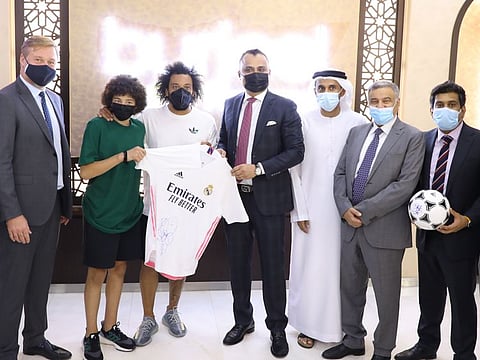Acclaimed Brazilian footballer and Real Madrid super defender Marcelo Vieria gifing jersy to Dr Shajir Gaffar, CEO of VPS Healthcare.