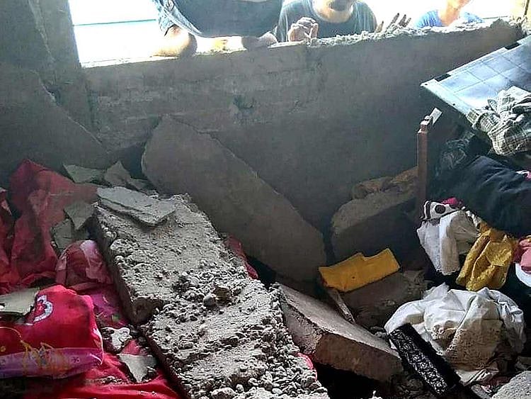 A damaged house in Tehoru village, central Maluku