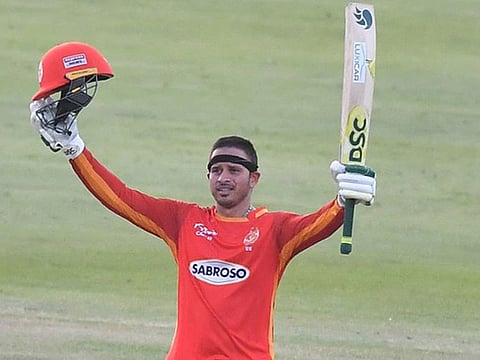 Usman Khawaja, the stand-in captain for Islamabad United, after completing his century in Abu Dhabi on Friday. 