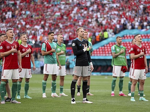 Hungary celebrate with fans at the end of the Euro 2020 championship Group F match against France, at the Ferenc Puskas stadium, in Budapest. The match ended in a 1-1 draw.