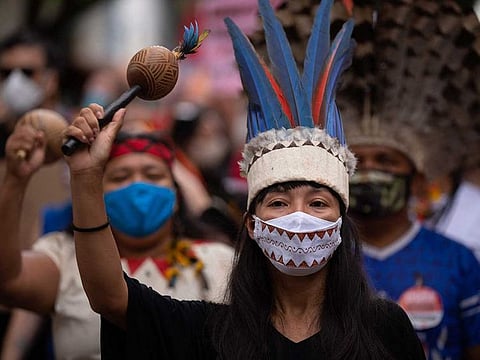 Indigenous take part in a protest against Brazilian President Jair Bolsonaro's handling of the COVID-19 pandemic in Manaus, Brazil on June 19, 2021. Brazil has passed the milestone of 500,000 COVID-19 victims. 
