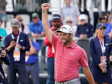 U.S. Open champion Jon Rahm, of Spain, walks across the 18th green after the final round of the U.S. Open Golf Championship, Sunday, June 20, 2021, at Torrey Pines Golf Course in San Diego.