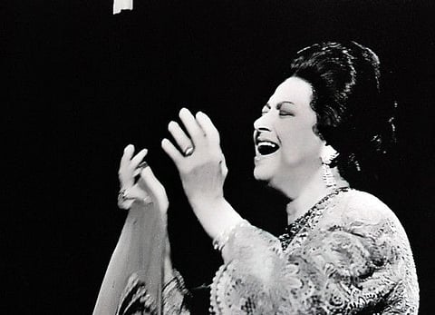 A file image of Umm Kalthoum performing at the Olympia concert hall in Paris, Nov. 14, 1967. A multimedia exhibition in Paris offers a rich flashback to a period between the 1920s and the 1970s when many female performers took center stage. 