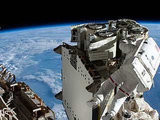 Photos: ISS astronauts complete a six-hour spacewalk to install solar panels
