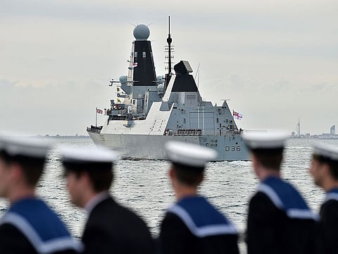 HMS Defender prepares to take part in a sail past to honour D-Day veterans on board the Royal British Legion's ship MV Boudicca en route to Normandy in a 2019 file photo..