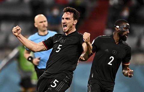 Germany's Mats Hummels and Antonio Ruediger celebrate after getting a late equaliser against Hungary during their Euro 2020 championship Group F match at the Allianz Arena in Munich, Germany.