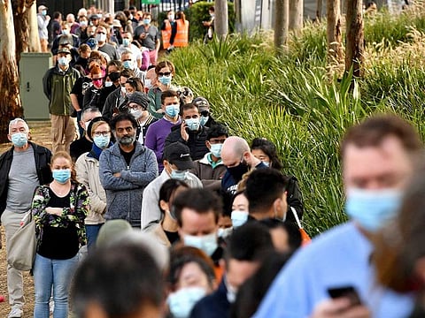 Countries with good access to vaccines are hopeful that the shots can dampen the inevitable rise of 'variants of concern', especially Delta, which is seens as 60% more transmissible the already highly infectious Alpha. Sydneysiders queue outside a vaccination centre in Sydney on June 24, 2021, as residents were largely banned from leaving the city to stop a growing outbreak of the highly contagious Delta COVID-19 variant spreading to other regions. 