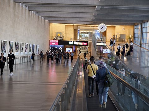 Travellers walk through the Ben Gurion International Airport in Tel Aviv, Israel.  
