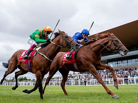 Hurricane Lane wins the Dubai Duty Free Irish Derby under William Buick 