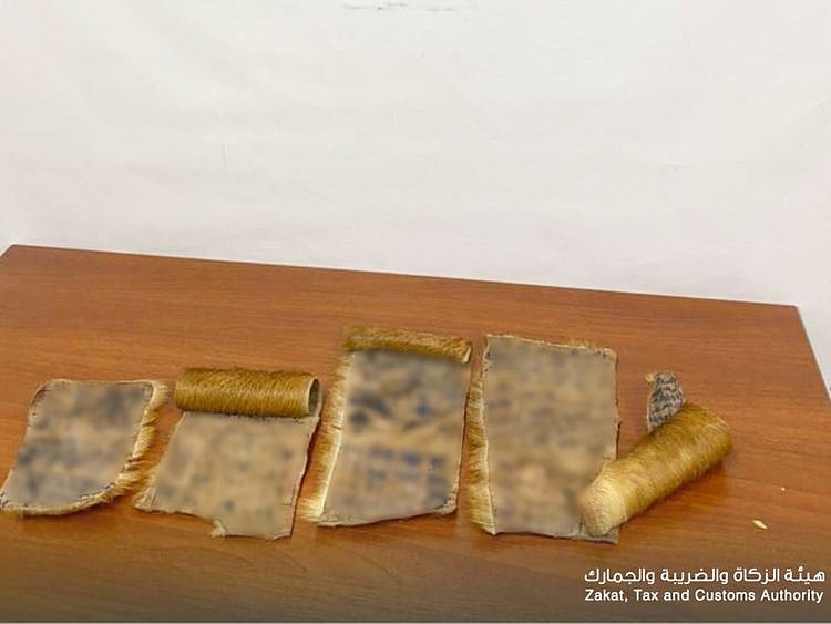 Suspected sorcery items seized with a passenger. 