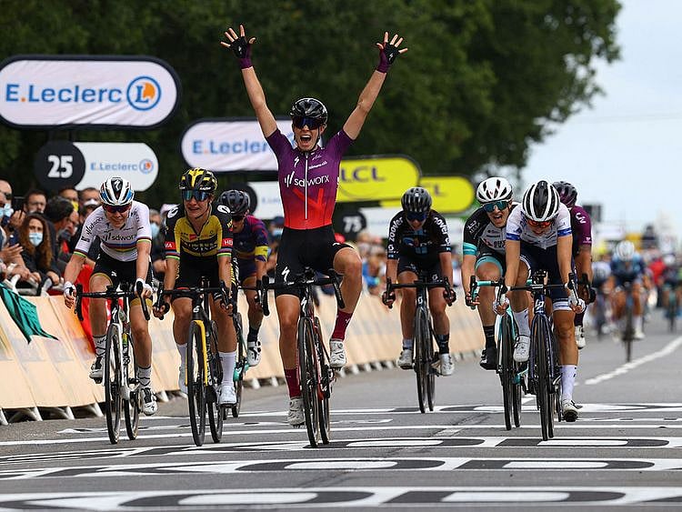 Team SD Worx rider Demi Vollering celebrates as she crosses the finish line during La Course prior to the 1st stage of the 108th edition of the Tour de France 