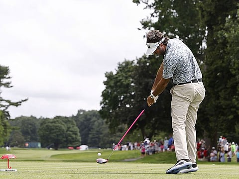 Bubba Watson plays his shot from the sixth tee during the third round of the Travelers Championship at TPC River Highlands 