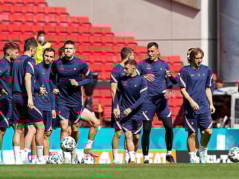 Luka Modric, right, and the Croatia team during training ahead of the Spain clash