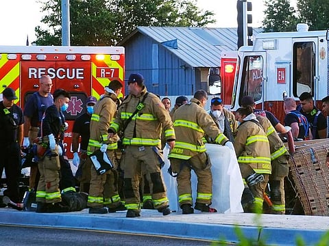 Albuquerque Fire Rescue crews work on victims of the fatal balloon crash at Unser and Central SW in Albuquerque, NM, on Saturday, June 26, 2021. 