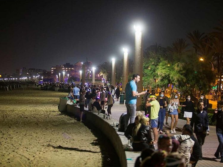People party in Playa de Palma beach on the island of Mallorca