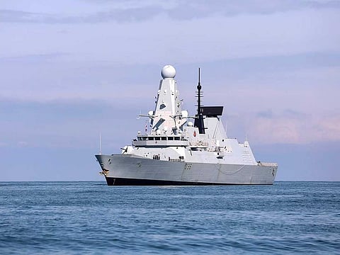 In this photo released by the Georgian Interior Ministry, British destroyer HMS Defender arrives at the port of Batumi, Georgia, Saturday, June 26, 2021.