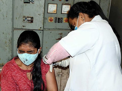 A young beneficiary receives a dose of COVID-19 vaccine, at Sadar Hospital in Ranchi, Jharkhand on Sunday, June 20, 2021.  
