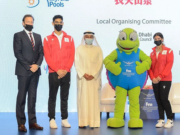 Swimmers Youssef Al Matrooshi and Layla Al Khatib with Brent Nowicki of Fina and Abu Dhabi Sports Council's Aref Hamad Al Awani and Dana the Hawksbill Turtle,  to launch the Fina Abu Dhabi World Swimming Championships.