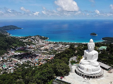 An aerial photograph of the Big Buddha and Kata Beach behind it on June 30, 2021, a day before the “Phuket Sandbox” tourism scheme that allows visits by people vaccinated against the COVID-19 coronavirus is set to launch.
