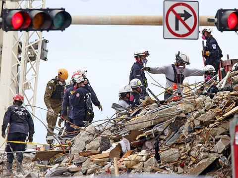 Crews continue working at the site of the Champlain Towers South condo building collapse in Surfside, Fla., Tuesday, June 29, 2021. The building collapsed early Thursday, trapping over 150 victims. 