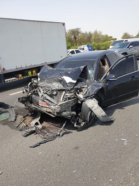 The damaged car after the crash on Sheikh Mohammed bin Zayed Road on Wednesday morning.