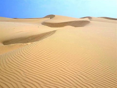 Oman's Mirbat sand dunes consist of transverse dunes at the bottom, topped by crescent dunes at the top.