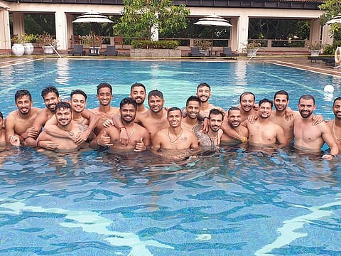 Happy bunch: Members of the Indian cricket squad bond at the hotel swimming pool after completing their quarantine period on Friday.
