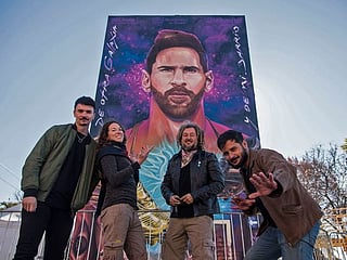 Photos: Multi-story mural for hometown hero Lionel Messi