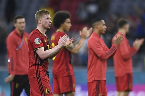 Belgium players applaud fans after a Euro 2020 championship quarterfinal match against Italy at the Allianz Arena in Munich, Germany. Italy won 2-1.