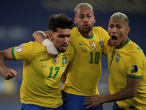 Brazil's Lucas Paqueta (left) celebrates with Neymar (centre) and Richarlison after scoring against Chile during their Copa America quarter-final on Friday.