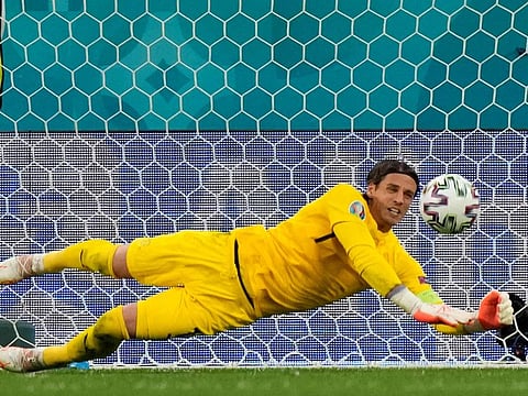 Switzerland's goalkeeper Yann Sommer saves the ball during the Uefa Euro 2020 quarterfinal football match against Spain at the Saint Petersburg Stadium in Russia on July 2, 2021.