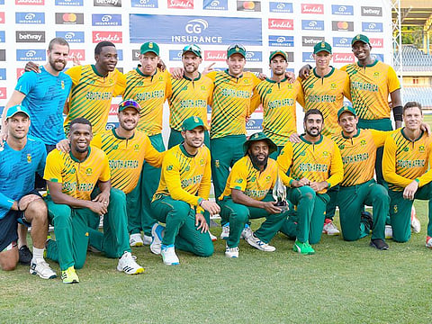 South Africa's players pose with the series trophy at the end of the 5th and final T20I against West Indies at Grenada National Cricket Stadium, Saint George's, Grenada, on July 3, 2021. 