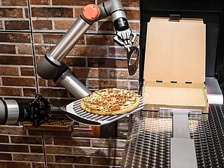 Photos: Paris gets a taste of pizza-making robots