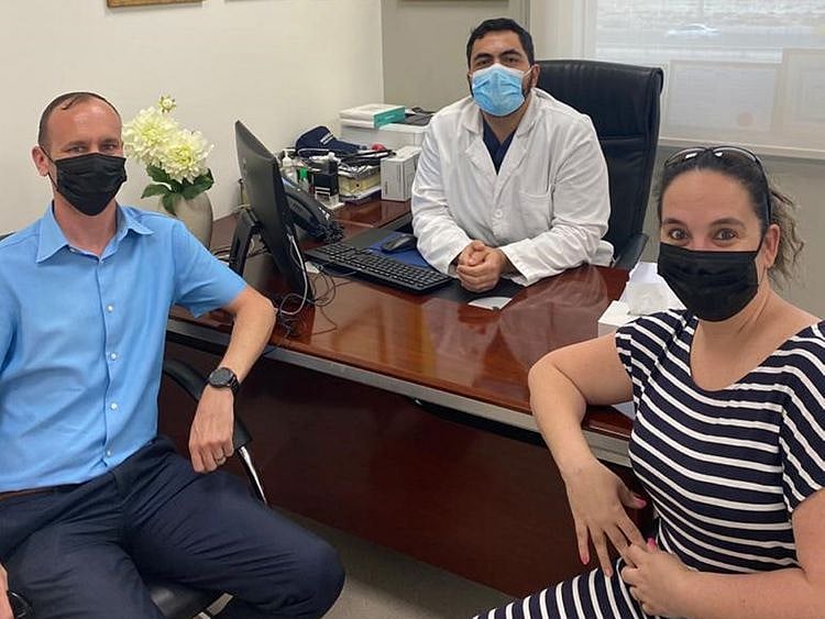 Dr Ahmad Mustafa, Consultant Interventional Cardiologist at Mediclinic Parkview Hospital with his patient (centre), Melissa Lindley (right)