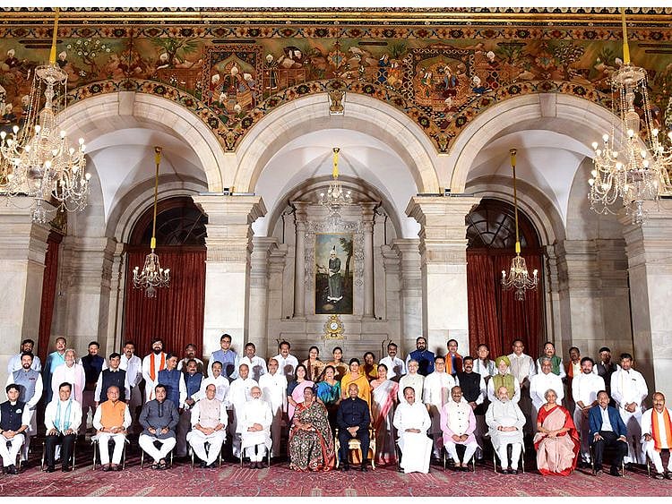 Prime Minister Narendra Modi in a group photograph with 43 ministers who took oath as federal cabinet ministers and ministers of state, at Rashtrapati Bhawan in New Delhi on Wednesday.