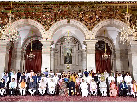 Prime Minister Narendra Modi in a group photograph with 43 ministers who took oath as federal cabinet ministers and ministers of state, at Rashtrapati Bhawan in New Delhi on Wednesday. 