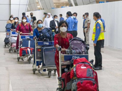 Aster Hospitals and Clinics staff arrive at Dubai International Airport from India with special travel permission