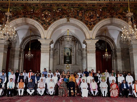 The newly sworn in ministers pose with Indian Prime Minister Narendra Modi, sixth left in front row, and other senior ministers at the Presidential Palace in New Delhi, India, Wednesday, July 7, 2021