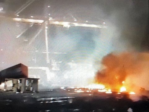 The fire broke out in a container on a ship preparing to dock in the port away from the main shipping line